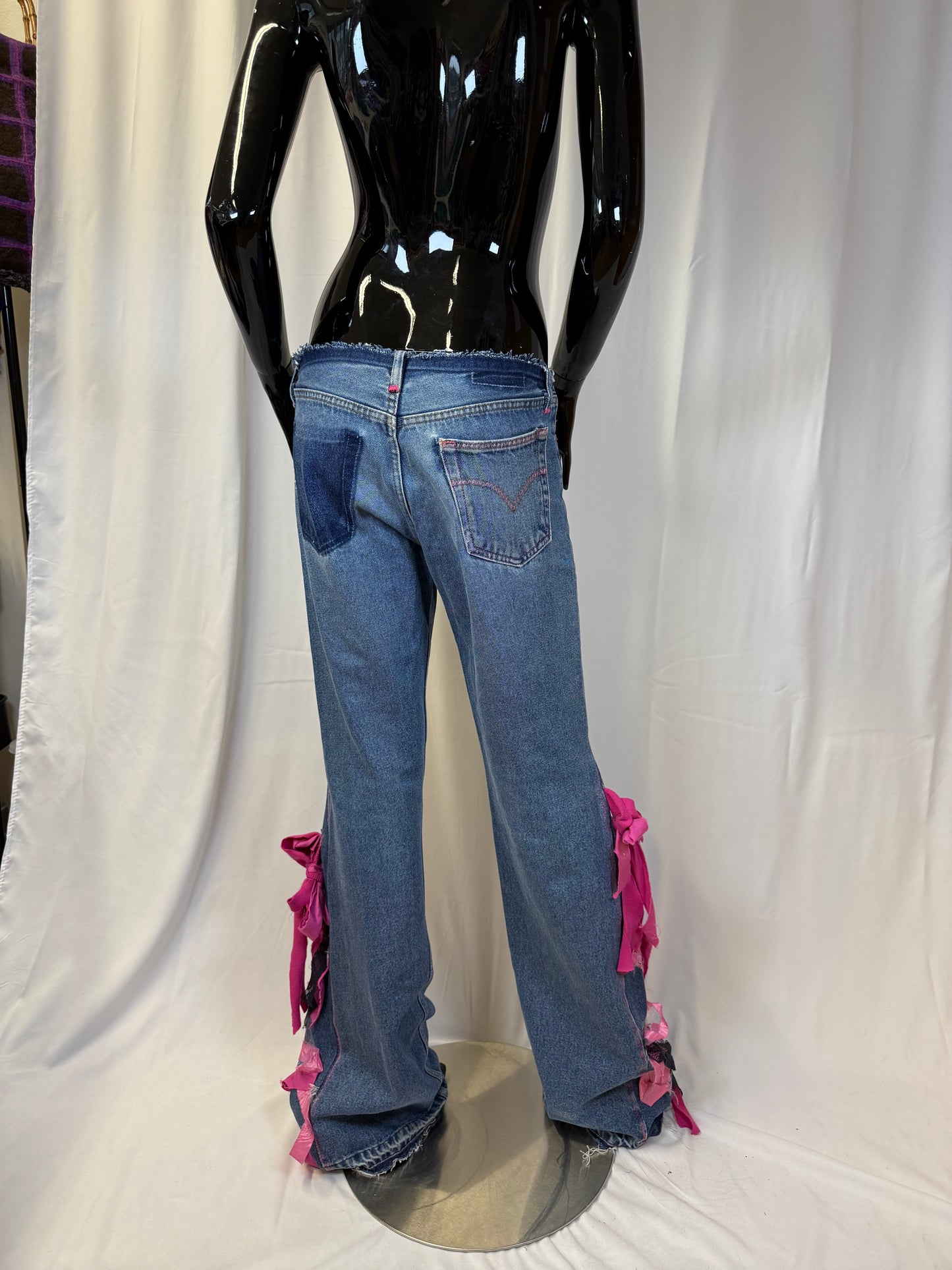 Low-waist jeans pink bow